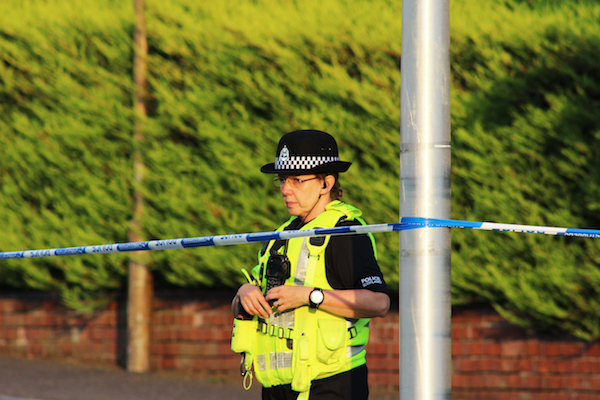 Investigation launched after dead body found in school playing fields