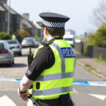 Police seal off street and wooded area in Granton