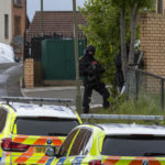 Armed police surround flats in Lochend