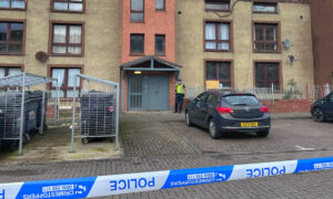Investigation launched after woman found dead in flat earlier today