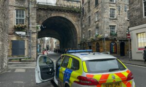 Man dies following collision with bus in Cowgate